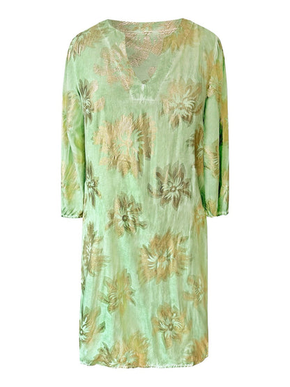 Tuniekjurk met V-hals, gouden print en 3/4 mouwen.